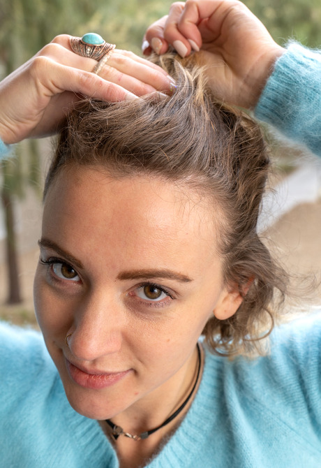 Playful teen Anika V undressing and showing small tits in bedroom - 3 of 16