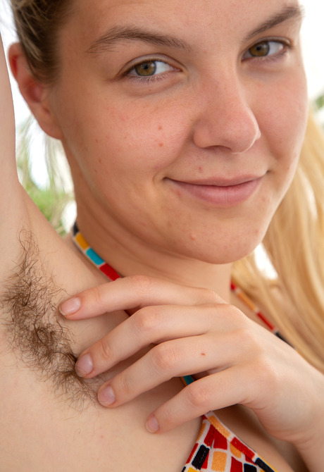 Cute blonde teen Mischa W showing cleavage and hairy armpits - 8 of 16