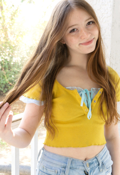 Cute teen girl Myra drops jean shorts and posing naked in bedroom - 6 of 16