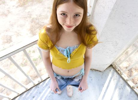 Cute teen girl Myra drops jean shorts and posing naked in bedroom - 8 of 16