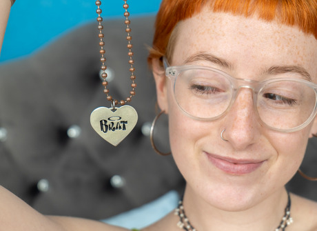 Short haired ginger Yvie teasing and flaunting pale naked body