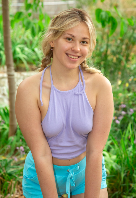 Cute blonde teen Selvaggia showing small tits naked outdoors - 2 of 16