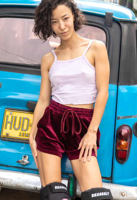 Skinny athletic asian Kira R roller skating and spreading hairy pussy - 4 of 16