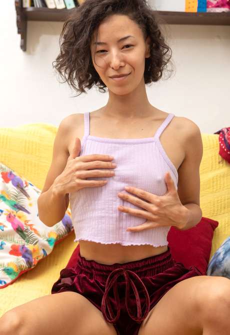 Skinny athletic asian Kira R roller skating and spreading hairy pussy - 8 of 16