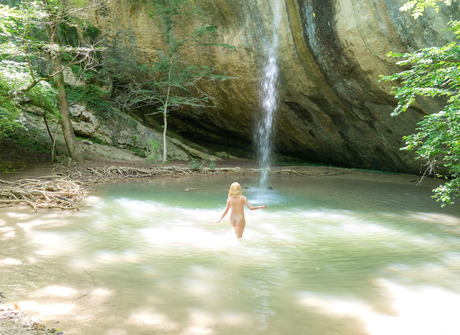 Cute blonde teen Una teasing naked outdoors in nature - 8 of 16