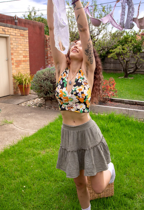 Slender natural amateur Mina B doing laundry and teasing naked