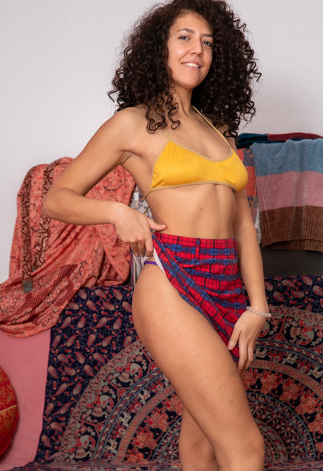 Curly haired amateur Dalilah fingering pussy in bedroom - 4 of 16