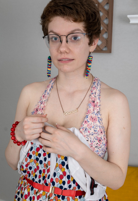 Short haired amateur Morgan K sharing big breasts and toying pussy