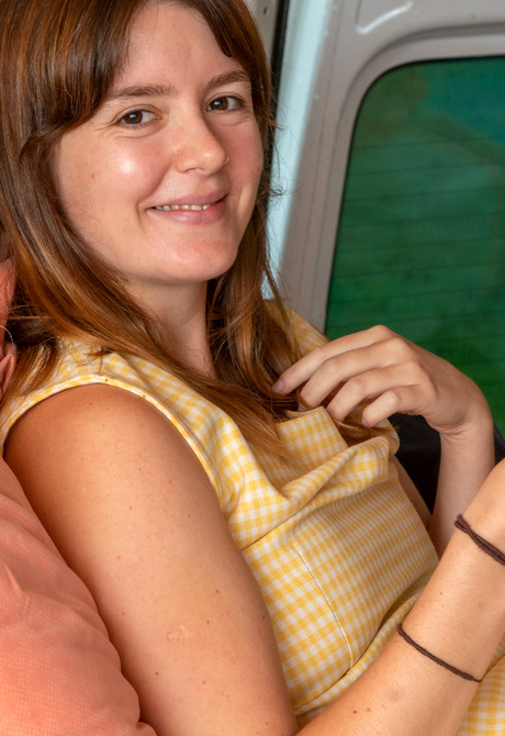 Playful amateur babe Grace R getting naked in her van and teasing outdoors