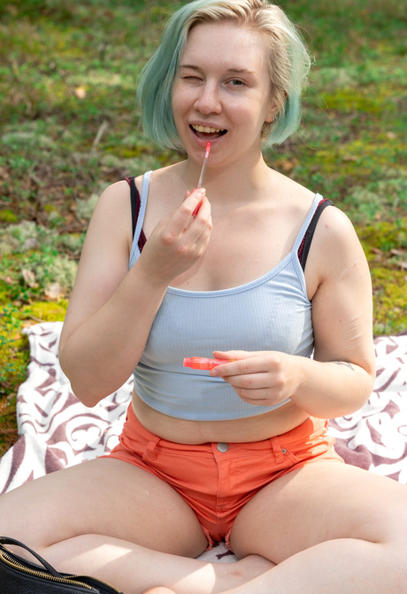 Chubby pale skinned amateur Eve F toying pussy outdoors in nature - 5 of 16