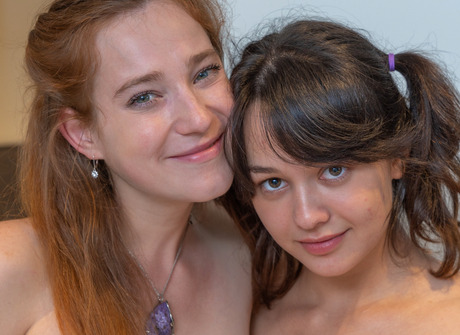 Petite lesbian teens Lilia and Zhenna licking and fingering each other - 16 of 16