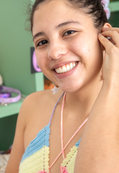 Playful teen Amalia P sharing small tits and teasing with vibrator